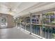Spacious screened balcony overlooking the waterway with clear views and a ceiling fan at 4694 Huron Rd, St Petersburg, FL 33708