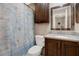 Bathroom featuring a shower/tub combination, modern toilet, and wooden vanity at 4694 Huron Rd, St Petersburg, FL 33708