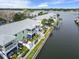Waterfront townhome boasts a private boat dock, outdoor seating, and stunning water views at 5012 Starfish Se Dr # B, St Petersburg, FL 33705