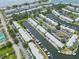 Aerial view of waterfront homes with boat docks and assigned parking at 5012 Starfish Se Dr # B, St Petersburg, FL 33705