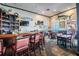 Interior view of a stylish bar area with stools, tables, and nautical decor at 5012 Starfish Se Dr # B, St Petersburg, FL 33705