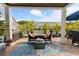 Relaxing patio with a comfortable seating area, an outdoor dining area, and views of the canal at 5012 Starfish Se Dr # B, St Petersburg, FL 33705