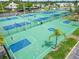 Aerial view of well-maintained tennis and basketball courts at 5012 Starfish Se Dr # B, St Petersburg, FL 33705