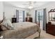 Serene bedroom with a comfortable bed, soft lighting, and neutral decor at 5812 52Nd N Ave, Kenneth City, FL 33709