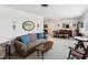 Inviting living room with neutral tones, comfortable seating, and ample natural light at 5812 52Nd N Ave, Kenneth City, FL 33709