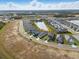 Aerial view of a residential neighborhood with a central lake at 6281 Dry Tortugas Dr, Sarasota, FL 34241