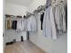 Walk-in closet featuring ample hanging space and shelving for clothing and accessories at 6281 Dry Tortugas Dr, Sarasota, FL 34241