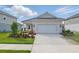 Charming single-story home boasting a well-manicured lawn and a spacious driveway with ample parking at 6281 Dry Tortugas Dr, Sarasota, FL 34241