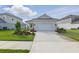 Beautiful one-story home with a well-maintained lawn and a spacious driveway at 6281 Dry Tortugas Dr, Sarasota, FL 34241