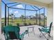Patio with chairs offering scenic pond views at 6281 Dry Tortugas Dr, Sarasota, FL 34241