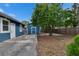 This property features a spacious backyard with shed, and large shade tree at 6409 N 23Rd St, Tampa, FL 33610