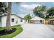 Backyard features an ample parking area and a detached garage at 6504 N 13Th St, Tampa, FL 33604