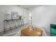 Bright living area featuring modern decor, stylish rug, and comfortable seating at 6504 N 13Th St, Tampa, FL 33604