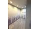 Unfinished bathroom with tiled floors and recessed lighting ready to be customized to your liking at 651 Boca Ciega Point S Blvd, St Petersburg, FL 33708