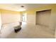 Unfinished bathroom area with modern toilet, slider doors, and walk-in closet; ready to be customized at 651 Boca Ciega Point S Blvd, St Petersburg, FL 33708