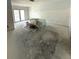 Bedroom with French doors offers potential for renovation at 651 Boca Ciega Point S Blvd, St Petersburg, FL 33708