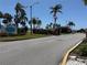 Boca Ciega Point entrance with mature trees, guard gate, and clear signage for a secure community at 651 Boca Ciega Point S Blvd, St Petersburg, FL 33708