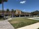 Well-maintained community building with shuffleboard courts and ample parking for residents and guests at 651 Boca Ciega Point S Blvd, St Petersburg, FL 33708