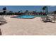 Sparkling blue community pool with ample seating and lounging at 651 Boca Ciega Point S Blvd, St Petersburg, FL 33708