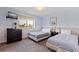 Cozy bedroom with calming colors, TV, and beach views, perfect for relaxation at 6700 Sunset Way # 303, St Pete Beach, FL 33706
