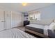 Bedroom featuring ample closet space, beach views and calming colors at 6700 Sunset Way # 303, St Pete Beach, FL 33706