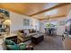 Comfortable living room with nautical decorations and small dining area at 6700 Sunset Way # 303, St Pete Beach, FL 33706