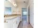Bright bathroom with double vanity and granite countertops at 6807 162Nd Pl, Parrish, FL 34219