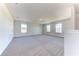 Expansive loft area with neutral carpet and plenty of natural light at 6807 162Nd Pl, Parrish, FL 34219
