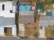 Overhead image of a home with a private backyard pool and patio, perfect for outdoor relaxation and entertainment at 8305 75Th Pl, Seminole, FL 33777