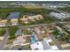 Picturesque aerial shot of houses near a lake, emphasizing the area's natural beauty and community setting at 8305 75Th Pl, Seminole, FL 33777