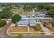 A charming two-story home with a pool, situated in a verdant, residential community at 8413 Lopez Dr, Tampa, FL 33615