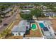 A charming home featuring a backyard swimming pool and a well-maintained surrounding neighborhood at 8413 Lopez Dr, Tampa, FL 33615
