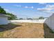 Fenced backyard, highlighting the in-ground pool area with a focus on the vinyl fencing at 8413 Lopez Dr, Tampa, FL 33615