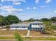 Inviting two-story home featuring well-maintained landscaping and a serene ambiance at 8413 Lopez Dr, Tampa, FL 33615