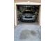 Attached one-car garage with a vehicle and available storage space at 8423 Edgewater Place Blvd, Tampa, FL 33615