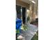 The patio area features an access door, hose hookup, and external air conditioning unit at 8423 Edgewater Place Blvd, Tampa, FL 33615