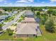 Scenic aerial view showcasing the property's location within a verdant community at 9219 Irondale Ln, Hudson, FL 34667