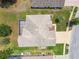 Overhead aerial view showing roof and the home's proximity to neighborhood amenities at 9219 Irondale Ln, Hudson, FL 34667