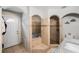 Bathroom with tub, tiled shower and granite countertop at 9616 56Th N St, Pinellas Park, FL 33782