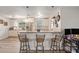 Bright, updated kitchen with stainless steel appliances, granite counters, and a breakfast bar seating area at 9616 56Th N St, Pinellas Park, FL 33782