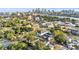 Aerial view of property with city skyline, waterfront views, and mature trees in desirable location at 113 Bosphorous Ave # 5, Tampa, FL 33606