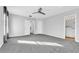Spacious main bedroom with ceiling fan and ensuite bathroom at 113 Bosphorous Ave # 5, Tampa, FL 33606