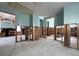 Spacious living room undergoing renovation with exposed studs, showcasing potential for customization and design at 13326 1St E St, Madeira Beach, FL 33708