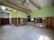 Spacious room with partially completed renovations, offering endless possibilities for creating an open-concept living space at 13326 1St E St, Madeira Beach, FL 33708