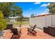 Beautiful backyard patio with comfortable chairs and lake view at 13751 Juniper Blossom Dr, Tampa, FL 33618
