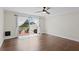 Serene room with sliding door to the patio that features two chairs overlooking a peaceful view at 13751 Juniper Blossom Dr, Tampa, FL 33618