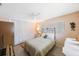 Inviting bedroom featuring ample closet space and a bright window for natural light at 13821 Joyce Dr, Largo, FL 33774