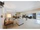 Cozy living room with a fireplace, comfortable seating, and built-in bookshelves at 13821 Joyce Dr, Largo, FL 33774