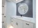 Modern bathroom features a stylish vanity, with a decorative mirror, and sleek fixtures at 1400 Gulf Blvd # 804, Clearwater Beach, FL 33767