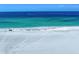 Beachfront view of the blue water and sandy beach offering a serene coastal living experience at 1400 Gulf Blvd # 804, Clearwater Beach, FL 33767